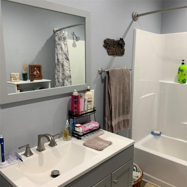 bathroom with vanity and shower / bathtub combination with curtain