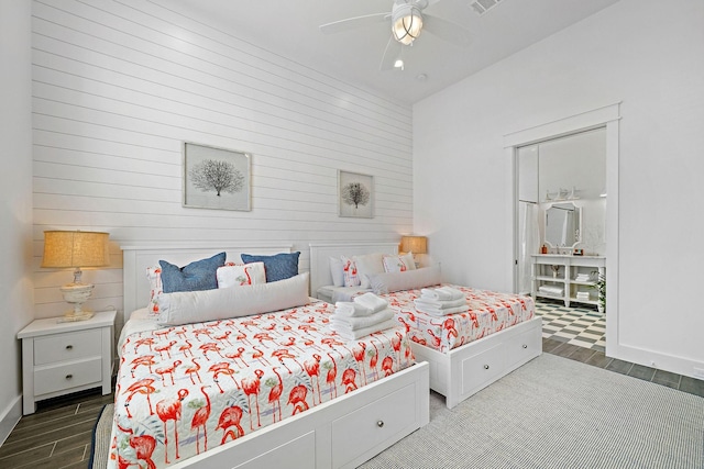 bedroom with hardwood / wood-style floors and ceiling fan