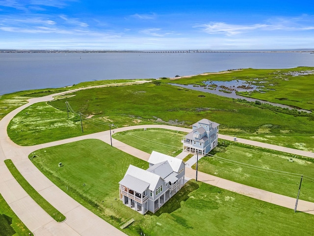 drone / aerial view with a water view