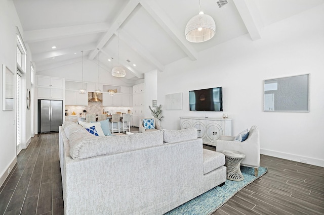 living room featuring beamed ceiling and high vaulted ceiling