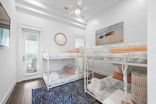 bedroom featuring access to exterior, hardwood / wood-style flooring, and ceiling fan