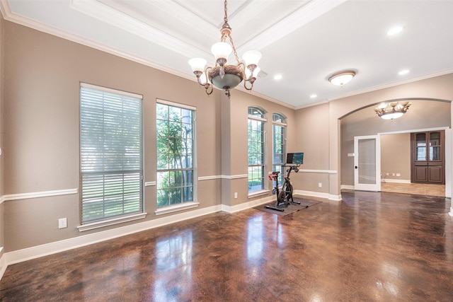 workout area featuring crown molding, a raised ceiling, french doors, and a notable chandelier