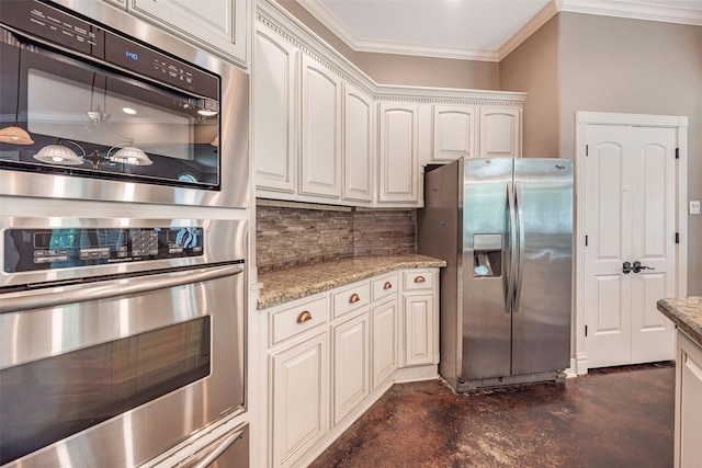 kitchen with appliances with stainless steel finishes, backsplash, ornamental molding, light stone countertops, and white cabinets