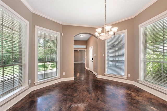 unfurnished dining area featuring a notable chandelier and crown molding