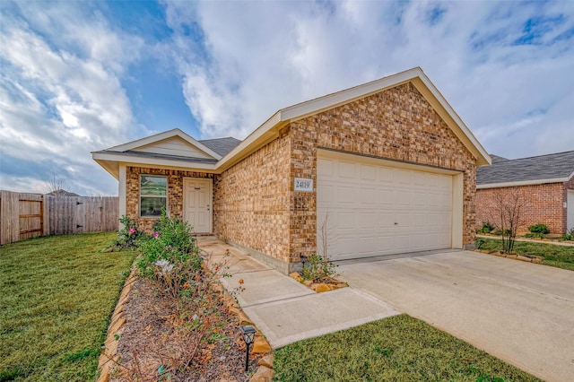 ranch-style home featuring a garage and a front yard