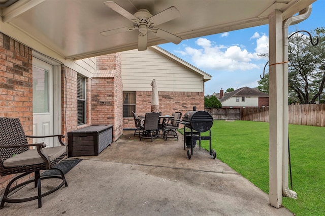 view of patio with grilling area and ceiling fan