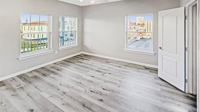 empty room featuring light hardwood / wood-style floors