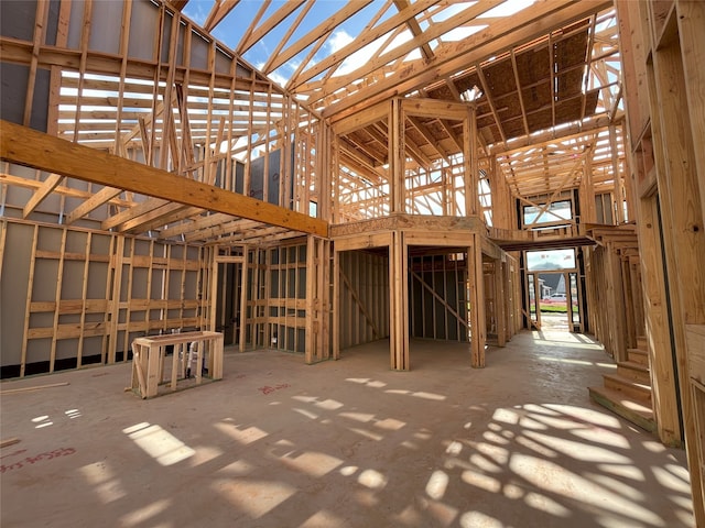 misc room with high vaulted ceiling