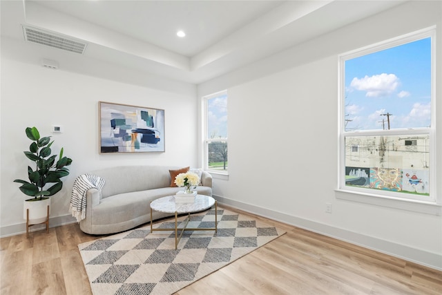 sitting room with light hardwood / wood-style flooring