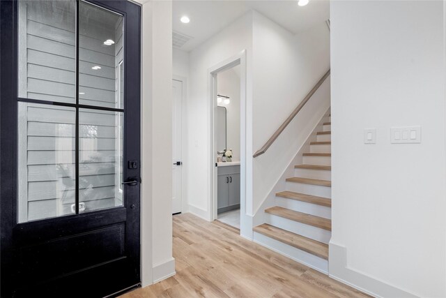 entrance foyer with hardwood / wood-style flooring