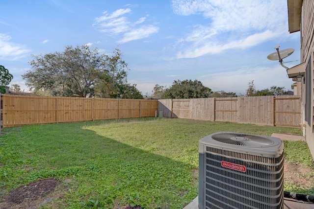 view of yard with central AC