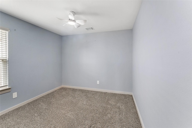 carpeted empty room with ceiling fan