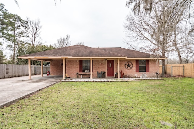 ranch-style house with a carport, a porch, and a front yard