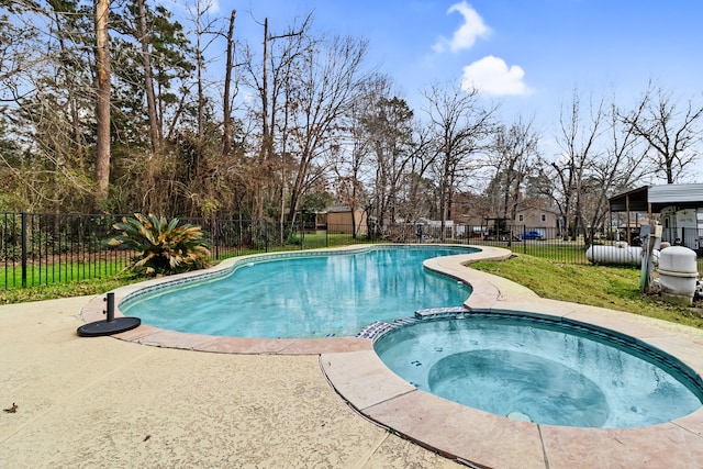 view of pool featuring an in ground hot tub