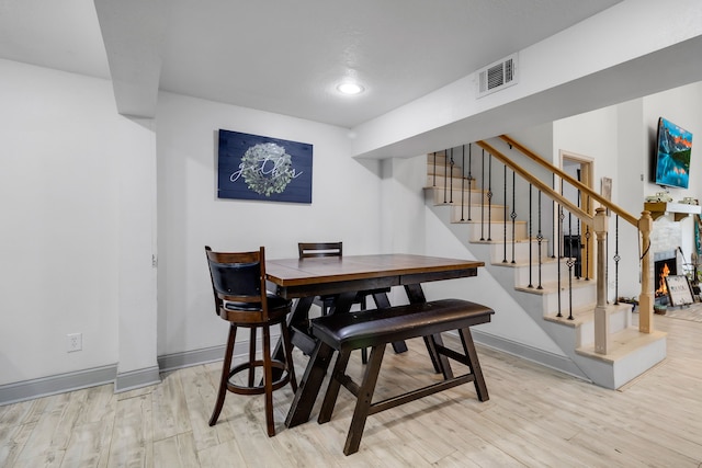 dining area with light wood-type flooring