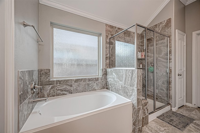 bathroom featuring ornamental molding and independent shower and bath