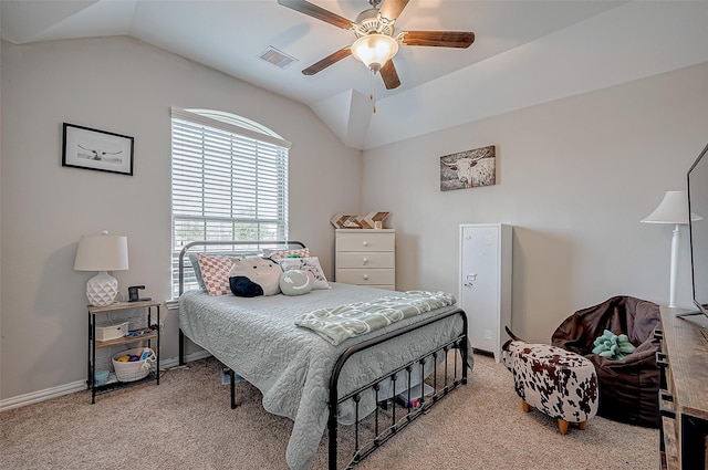 carpeted bedroom featuring ceiling fan and vaulted ceiling