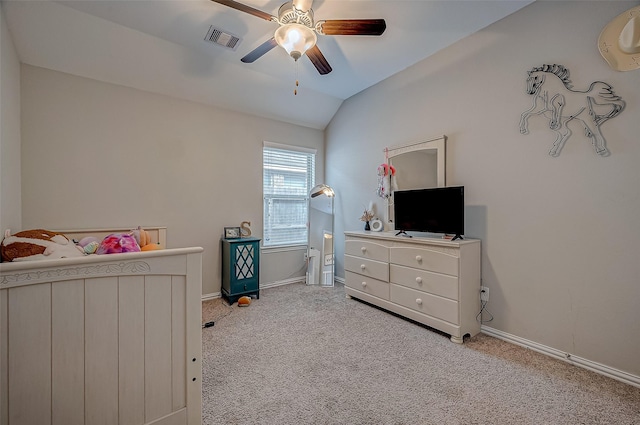 carpeted bedroom featuring vaulted ceiling and ceiling fan