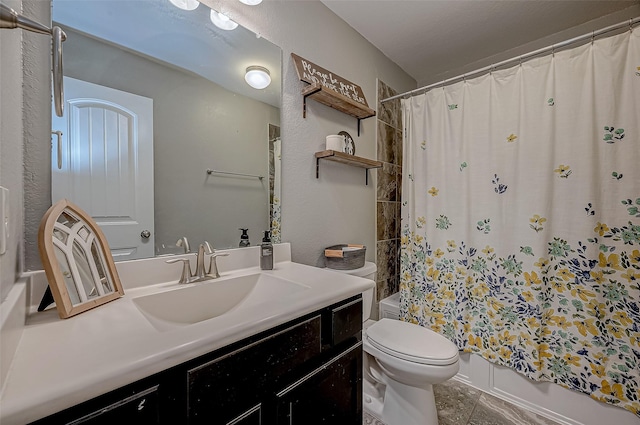 full bathroom with vanity, toilet, and shower / bath combo with shower curtain