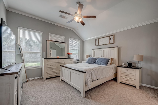 bedroom featuring multiple windows, ornamental molding, lofted ceiling, and light carpet