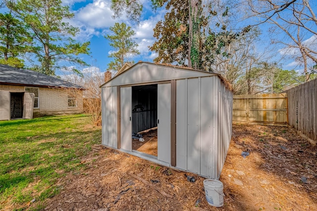 view of outdoor structure with a yard