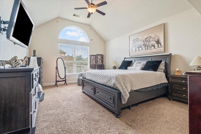 bedroom featuring light carpet, vaulted ceiling, and ceiling fan