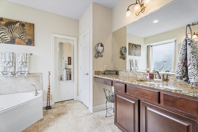 bathroom with vanity and a bathing tub