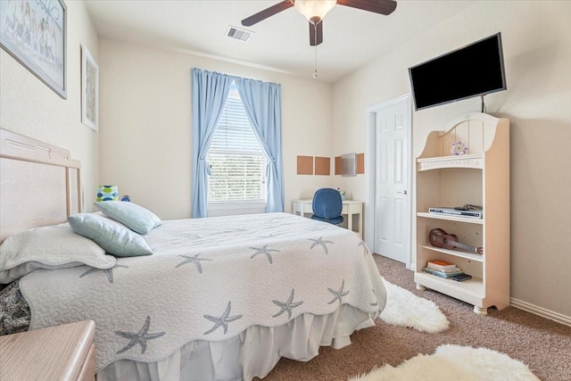 carpeted bedroom featuring ceiling fan