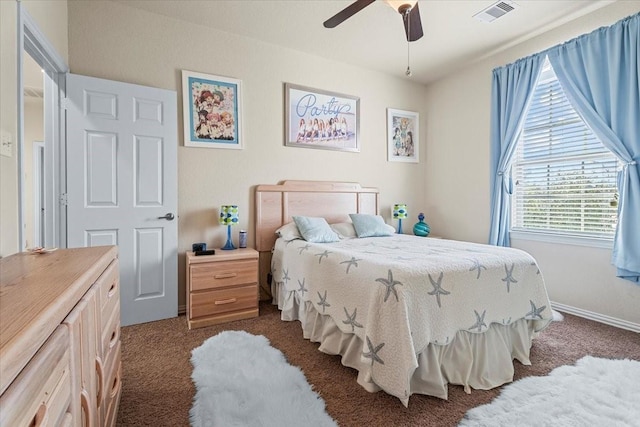 carpeted bedroom featuring ceiling fan