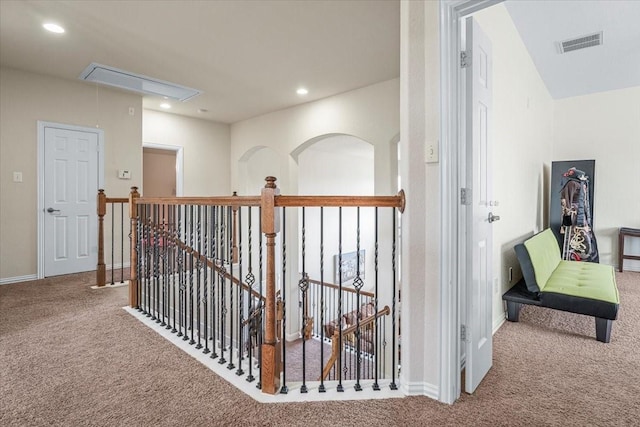 hallway with carpet flooring