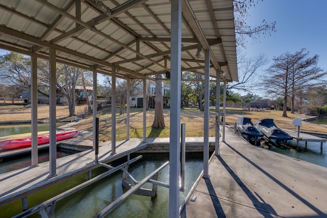 dock area with a water view