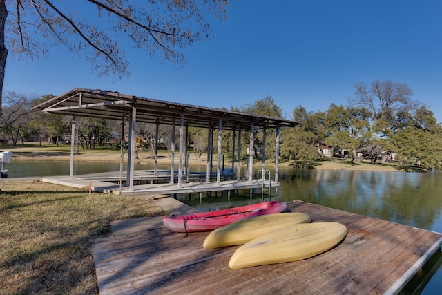 dock area with a water view