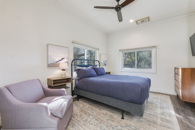 bedroom with wood-type flooring and ceiling fan