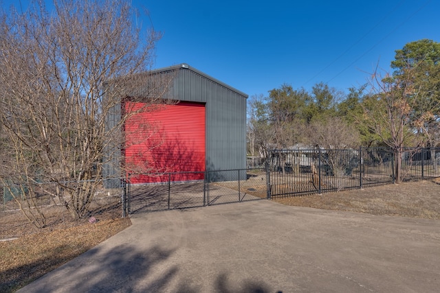 view of outbuilding featuring a garage