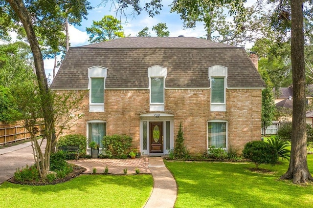 view of front of house with a front yard