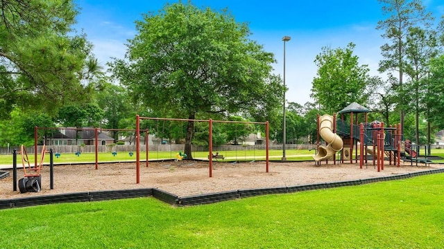 view of jungle gym featuring a yard