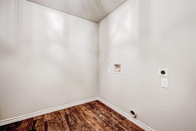 laundry room with hookup for a washing machine, electric dryer hookup, wood finished floors, laundry area, and baseboards