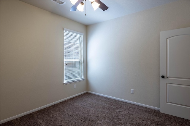 unfurnished room with ceiling fan and carpet floors