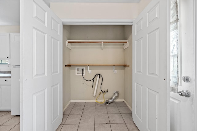 laundry room featuring plenty of natural light, washer hookup, and light tile patterned floors