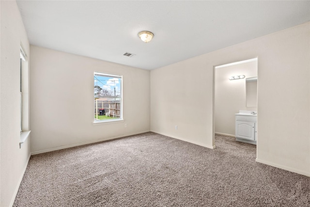 unfurnished bedroom featuring carpet flooring