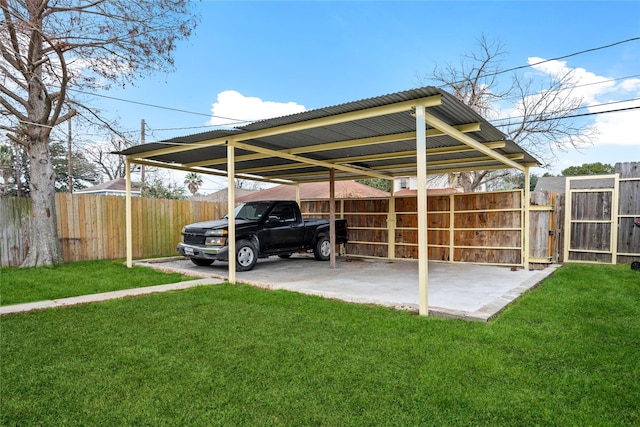 view of parking featuring a lawn and a carport