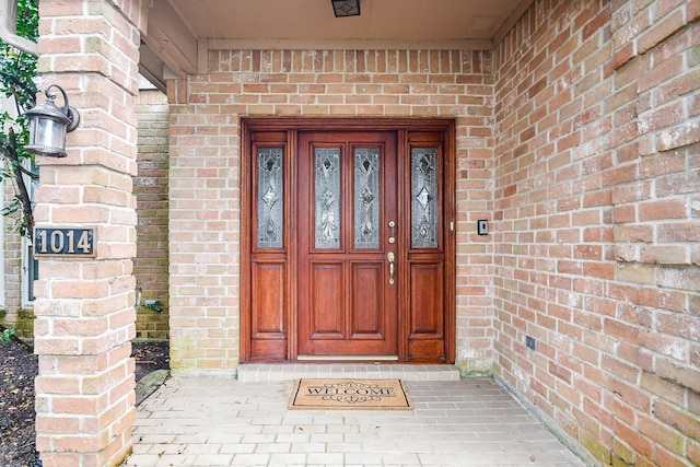 1014 Goldfinch Ave, Sugar Land, TX 77478 - view of exterior entry featuring brick siding