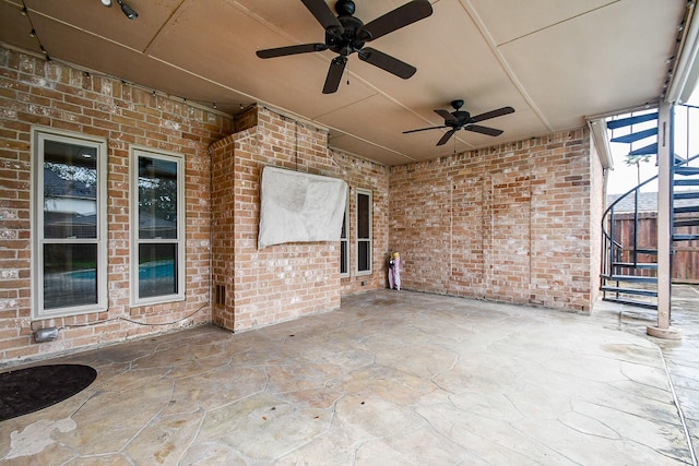 view of patio / terrace featuring ceiling fan