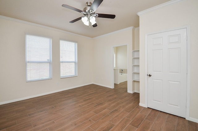 unfurnished bedroom featuring ornamental molding, dark hardwood / wood-style floors, and ceiling fan