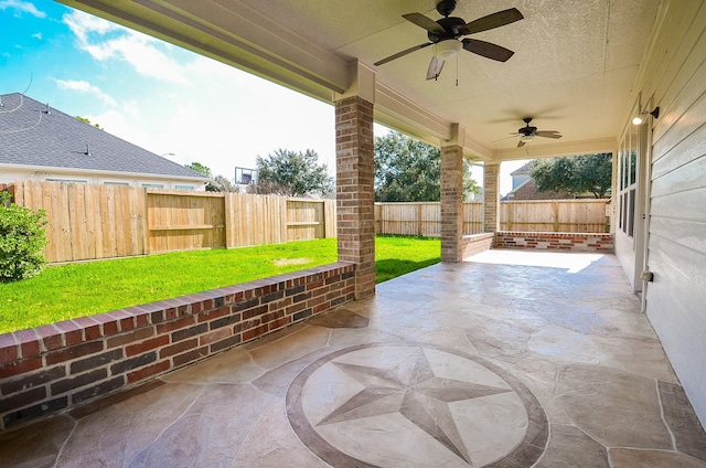 view of patio with ceiling fan