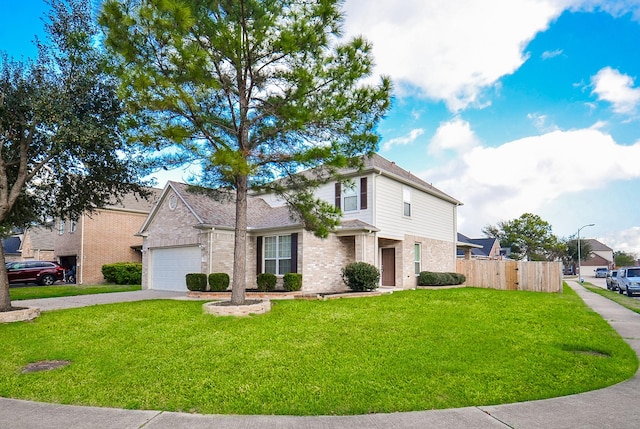 view of front of house featuring a garage and a front yard