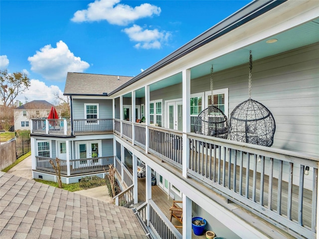 exterior space with french doors and a balcony