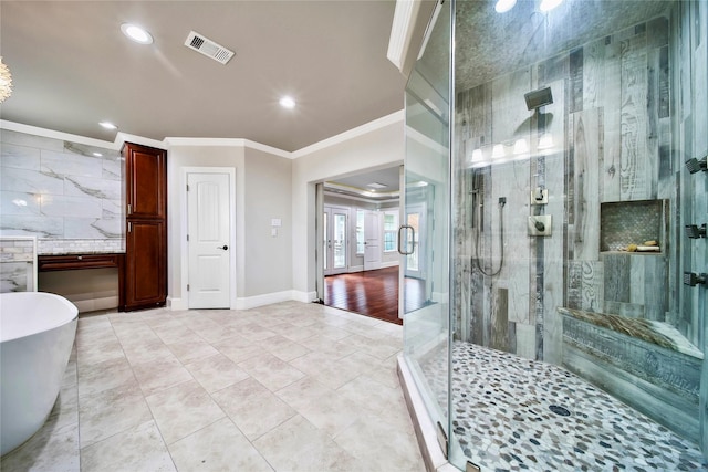 bathroom with crown molding, separate shower and tub, and tile patterned flooring