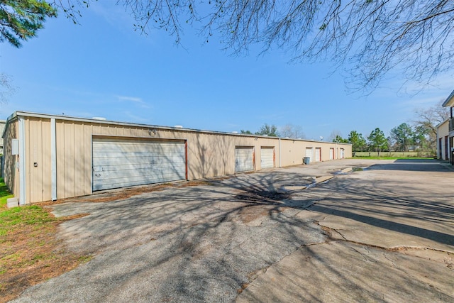 view of outbuilding with a garage