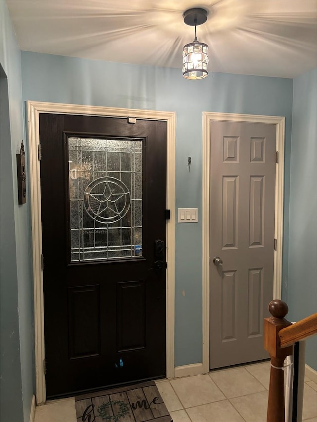 entrance foyer featuring light tile patterned flooring